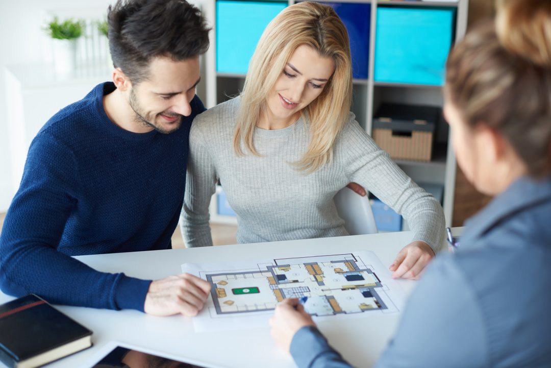 couple meeting with real estate agent.jpg